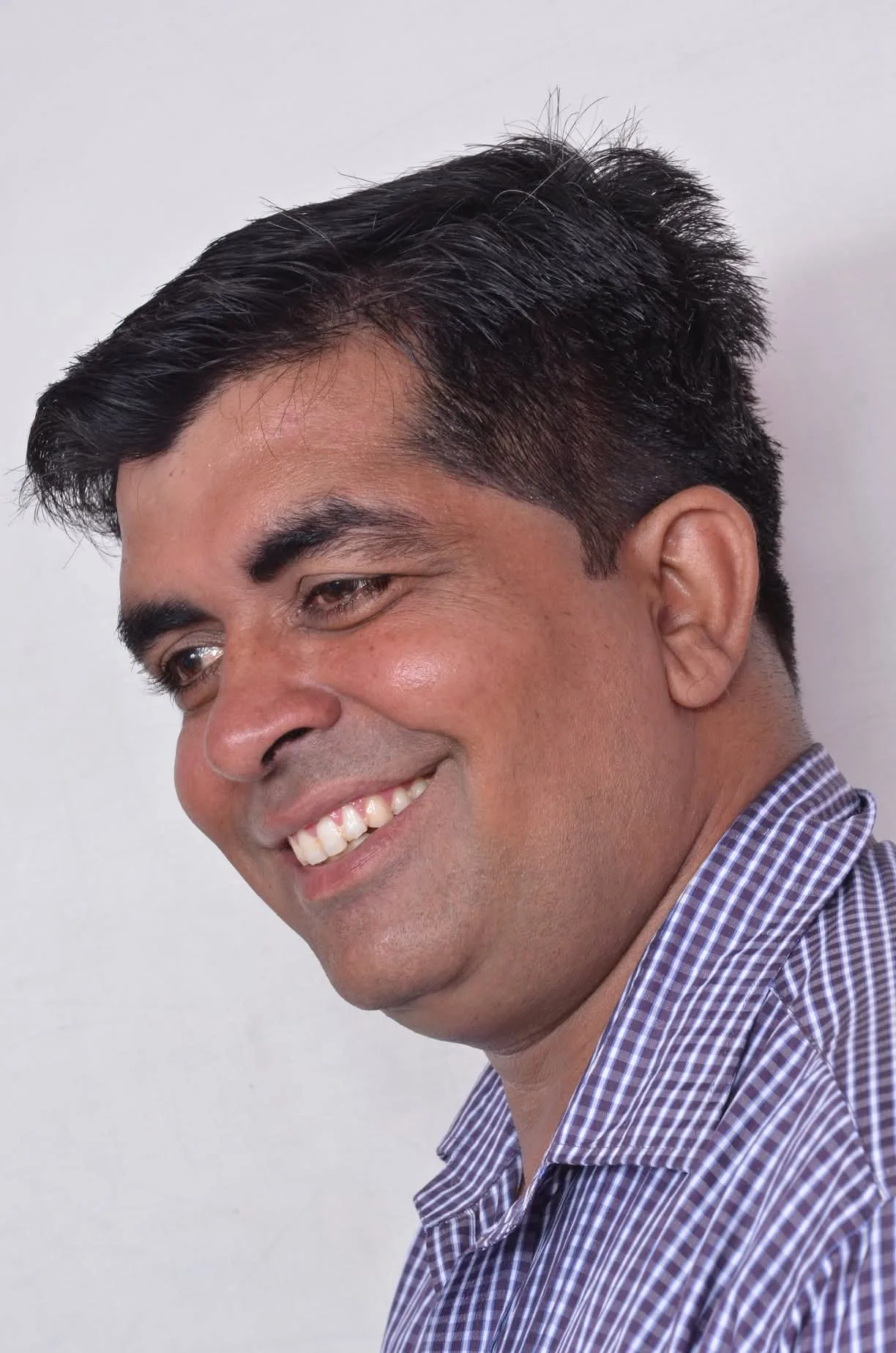 Dr. Avadhesh Kaushik in a contemplative profile portrait