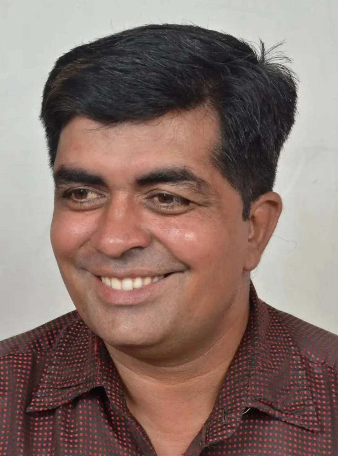 Dr. Avadhesh Kaushik close-up editorial portrait
